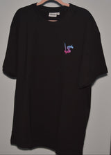 Black t-shirt with a small logo on a hanger against a plain background